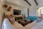 Comfy living area with satellite TV and ocean views from your couch 